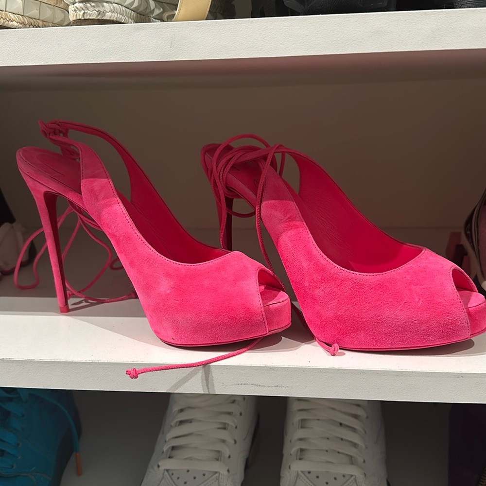 Hot pink Louboutin, suede lace up shoes
